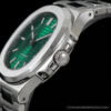 Montre en acier avec cadran vert émeraude