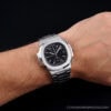 Steel wristwatch with a black dial
